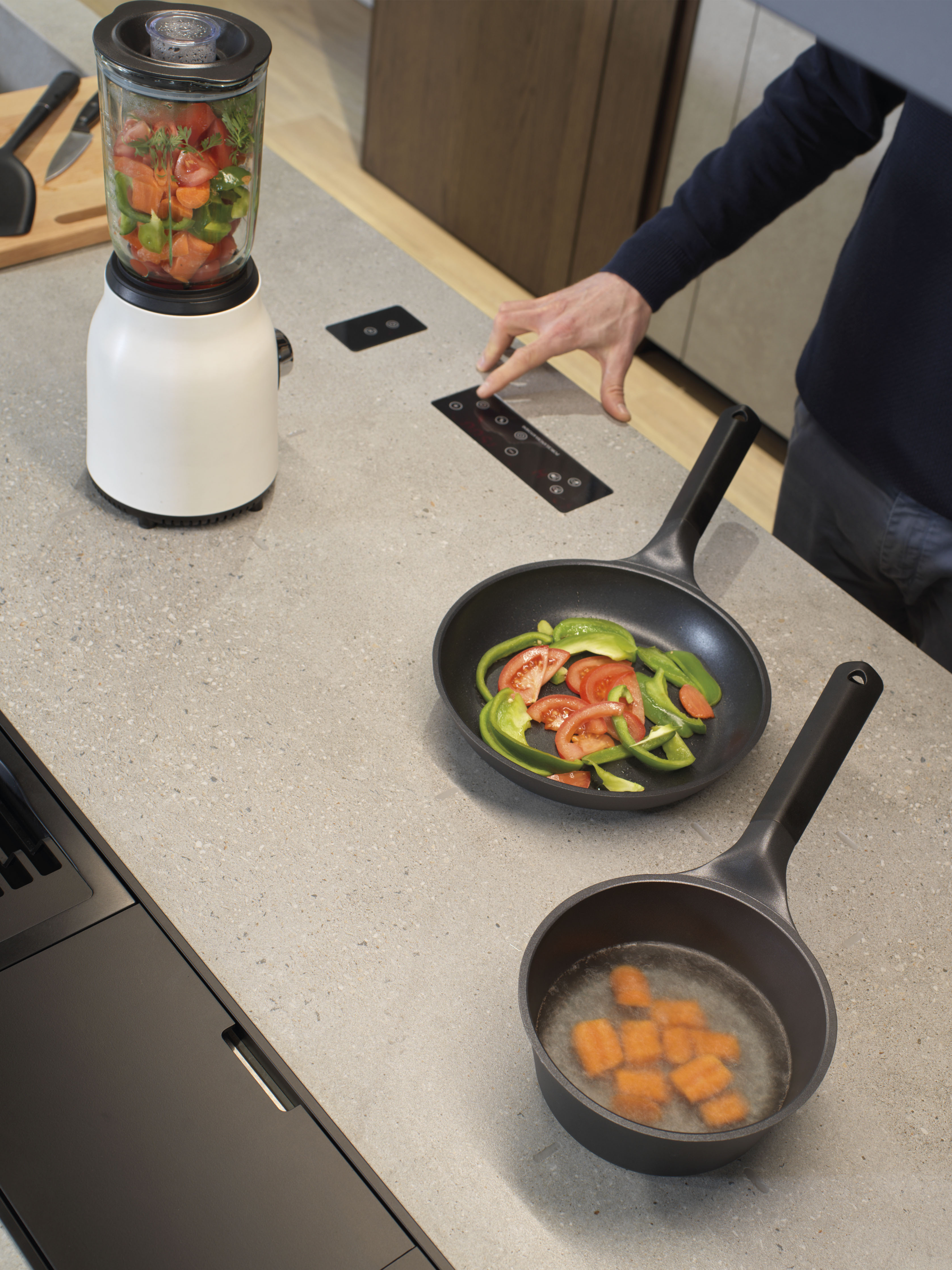 Invisible cooktop with dual inductive technology